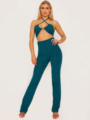 Top de cultivo de halter cruzado y pantalón coorden