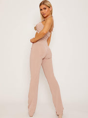 Top de cultivo de halter cruzado y pantalón coorden