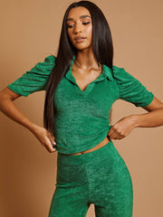 Handdoekstof met pieptophuls en de coörde van de flare broek