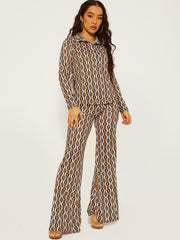 Allover-Druckknopfkragenoberteil und Hosen-Co-ordte