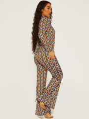 Allover-Druckknopfkragenoberteil und Hosen-Co-ordte