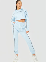 Piping-details bijgesneden hoodie & jogger-coöperatie