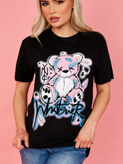 Cualquiera que sea la camiseta de detalle gráfico gráfico de peluche