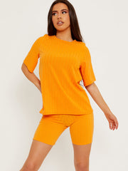 Coordenada de top y pantalones cortos de gran tamaño