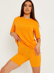 Coordenada de top y pantalones cortos de gran tamaño