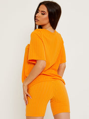 Coordenada de top y pantalones cortos de gran tamaño