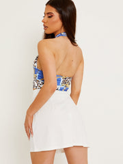 Top de halter de halter impresa en cadena de leopardo