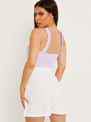 Ruches franje riemen bodysuit