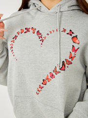 Sudadera con capucha gráfica de mariposa corazón