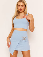 Promi Olivia Wrap über Schnallenrock & Top Co-ord