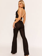 Rippengeschnittenes Detail des Halfter-Crop-Tops und Hosen-Co-ordte